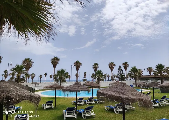 Apartamento de Lujo en primera linea playa, Piscina, Tenis, Padel, Gimnasio, Wifi, Garaje
